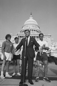Kennedy in front of the Capitol building